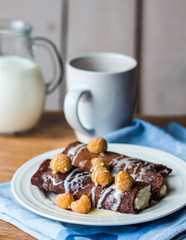 eat chocolate pancakes with cottage cheese and condensed milk,br
