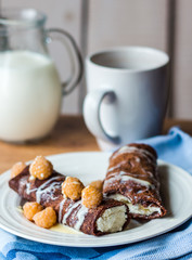 eat chocolate pancakes with cottage cheese and condensed milk,br