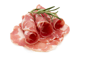 Dried pig meat slices. Delicatess.