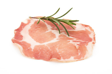 Dried pig meat slices. Delicatess.