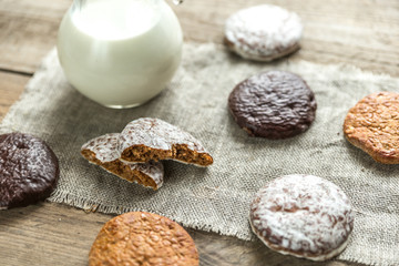 Glazed gingerbread cakes with pitcher of milk