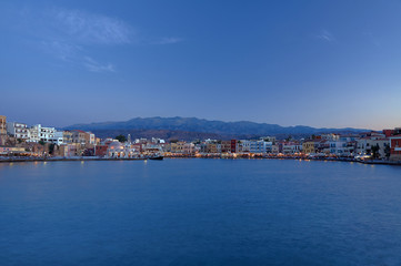 Fototapeta na wymiar The old port in evening in city of Chania, Crete.