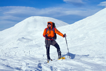 Winter hiking in snowshoes.