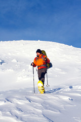 Winter hiking in snowshoes.