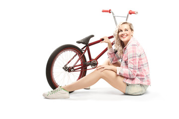 Beautiful blonde with a BMX bike