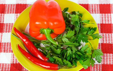 parsley, sweet and hot peppers in a bowl