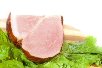 Smoked meat and lettuce on the board