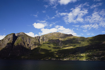 Fototapeta na wymiar Norway fjord landscape panorama. Aview with mountains and see