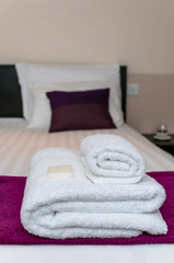Obraz na płótnie Canvas Closeup clean towels and soap in hotel room