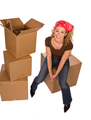 Boxes: Woman Sitting On Cardboard Box