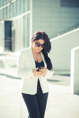 beautiful long black hair elegant business woman using smartphon