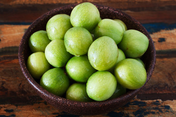 Brazilian fruit Spondias tuberosa (Brazil plum, imbu, umbu) in b