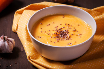 Carrot soup won wooden backgraund