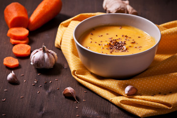 Carrot soup won wooden backgraund