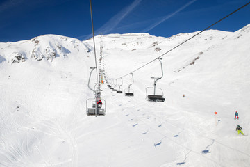 Fototapeta na wymiar Chair lift at a ski resort St. Anton am Arlberg in winter time