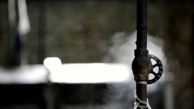 Steam leaking from a pipe