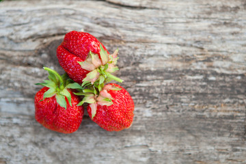 Strawberry on rustic wooden table