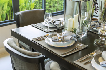 table set on wood dinning table at home