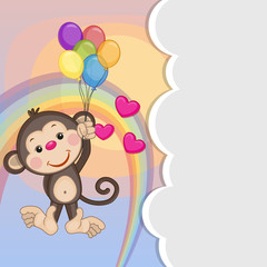 Obraz na płótnie Canvas Monkey with balloons