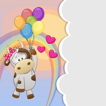 Cow with balloons