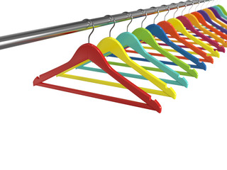 Colorful clothes hangers isolated on white background