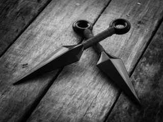 black and white throw ninja weapons © Nattapol_Sritongcom
