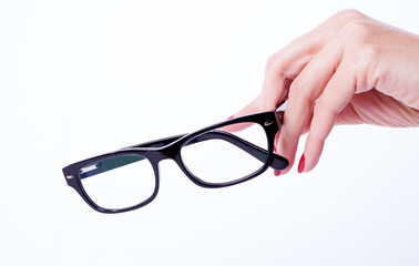 Woman hands holding glasses