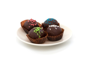 Chocolate balls isolated on white background