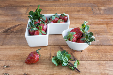 Beautiful strawberries on the wooden table