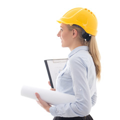 side view of dreaming business woman architect in builder helmet