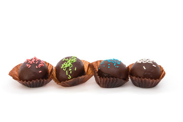 Chocolate balls isolated on white background