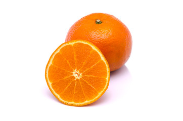 Orange mandarins with green leaf isolated on white background