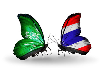 Two butterflies with flags Saudi Arabia and Thailand