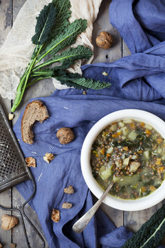 rustic vegetables soup with legumes and lacinato kale