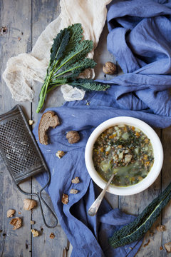 rustic vegetables soup with legumes and lacinato kale