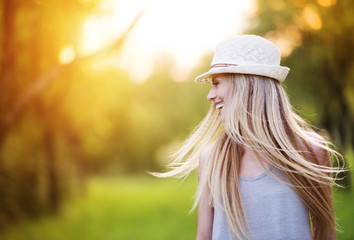 Beautiful woman outside in a park.