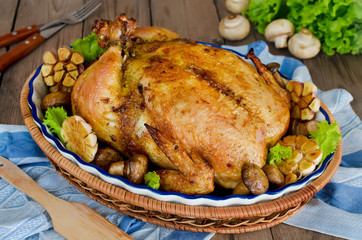 Whole roasted chicken stuffed with buckwheat and mushrooms