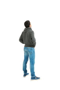 man standing on white  seen from behind