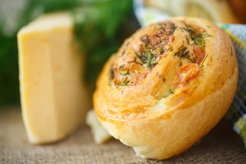 bun with cheese and herbs