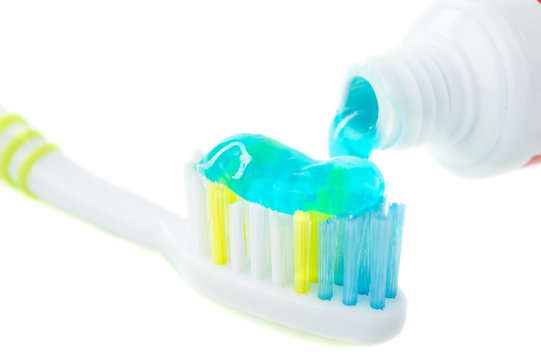 A toothbrush with toothpaste on isolated