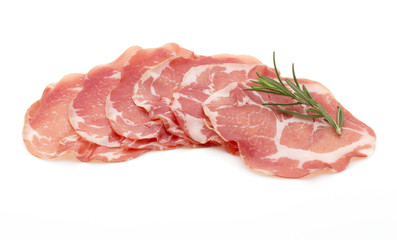 Dried pig meat slices. Delicatess.