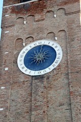 bell tower with  large clock with Roman numerals