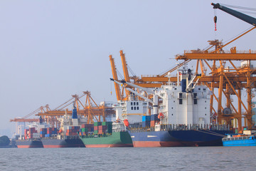 Fototapeta premium commercial container ship on port use for water transport and sh