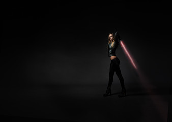 Fototapeta na wymiar futuristic hero with laser sword
