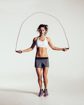 Fit Young Woman Skipping Rope