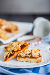 Pie in the short pastry with orange jam and milk