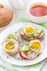 buns with boiled egg and vegetables, vertical