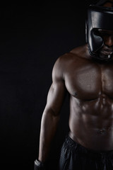 Fototapeta na wymiar Muscular body of african male boxer