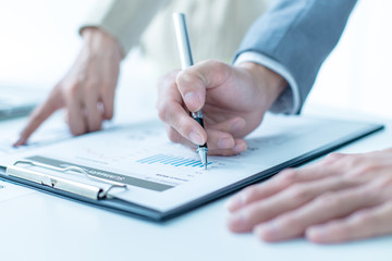 Business people discussing the charts and graphs showing the res