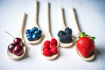 Berries on wooden background